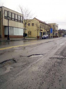 Potholes abound on Third Street, on what was once hoped to be a tourist magnet.