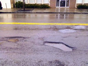 The potholes persist well into Mayor Dyster's third term.