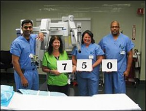 Pictured, from left: Dr. Bala Thatigotla, Medical Assistant Noel Fotus, Director of Surgical Services Shelly Meigs, R.N., and Surgical Technician Robert Abrams gather around SAL, a da Vinci robotic surgery system, to celebrate the 750th robotic surgery performed at Niagara Falls Memorial Medical Center.