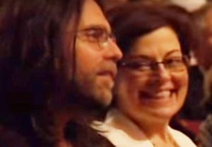 Keith Raniere and Nancy Salzman in the audience when the Dalai Lama appeared in Albany.