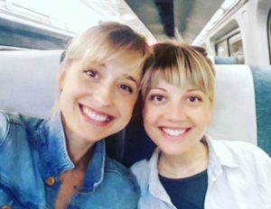 Allison Mack and Nicki Clyne, both members of DOS. They might be married.